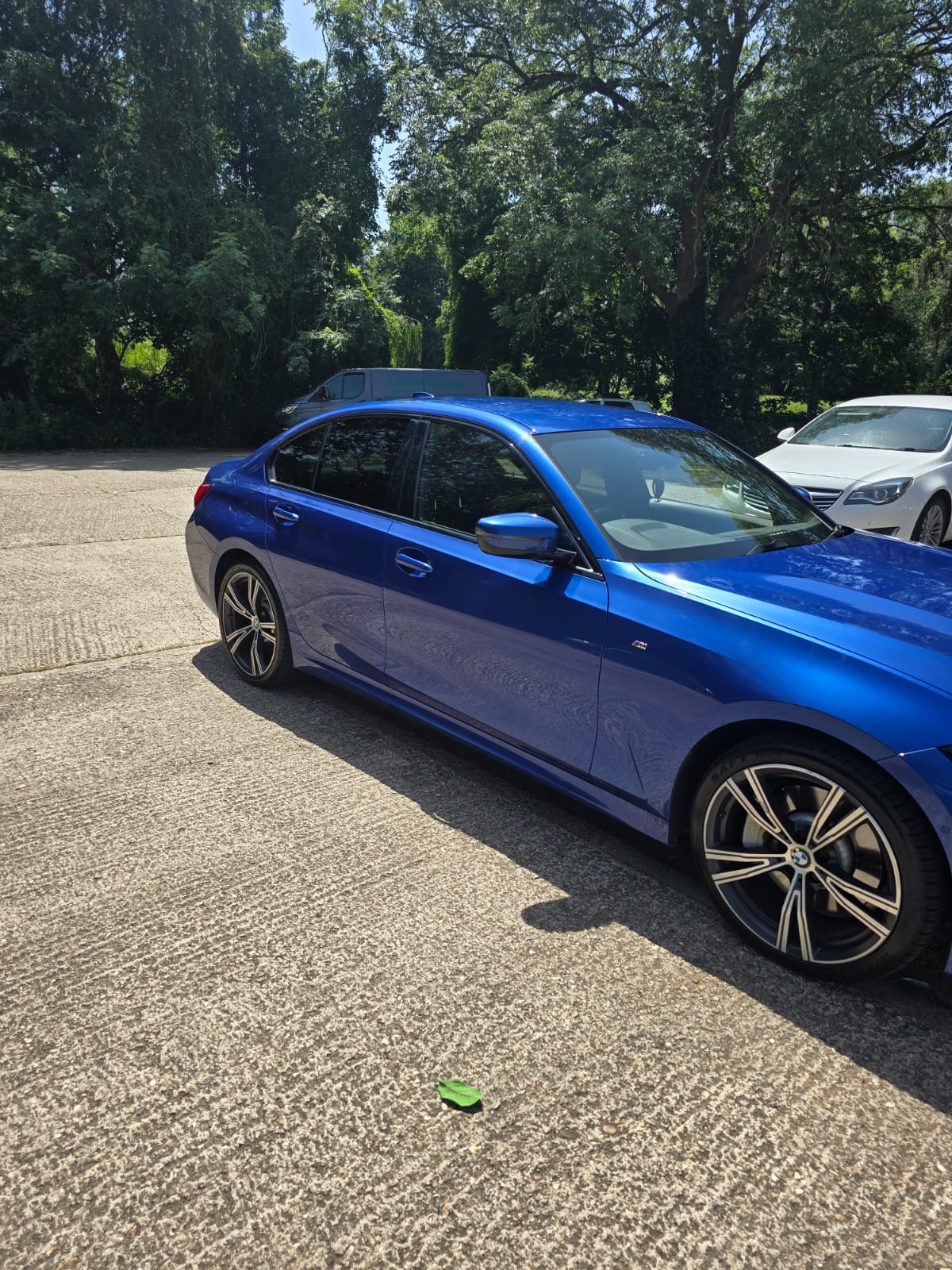 Side view of blue BMW 330e M Sport